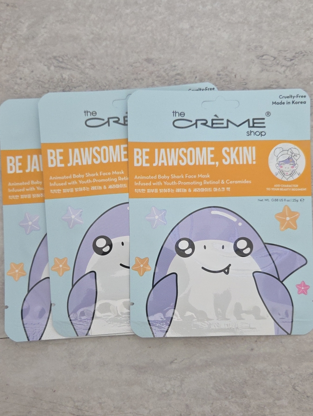 the CRÈME shop Be Jawsome, Skin! Purple Animated Baby Shark Face Mask